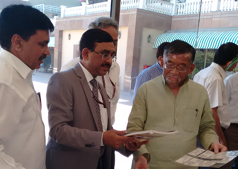 Honorable Textile Minister Shri Santosh Kumar Gangwar along with Shri P.C Vaish, Chairman and Managing Director NTCL, observing the Rajbhasha Hindi activities/functions during the Meeting of Hindi Advisory Committee of Ministry Of Textiles on 10 June 2015 held at Mumbai.